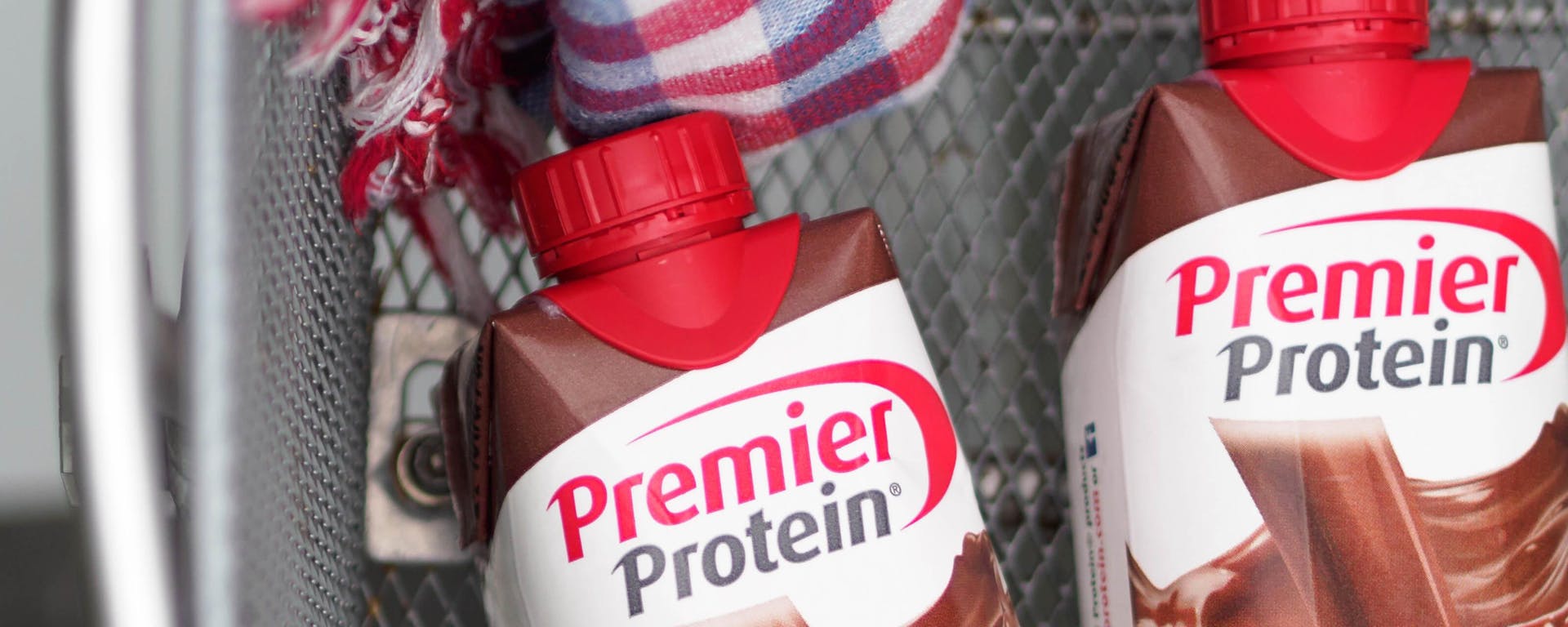 Two Premier Protein shakes in a locker.