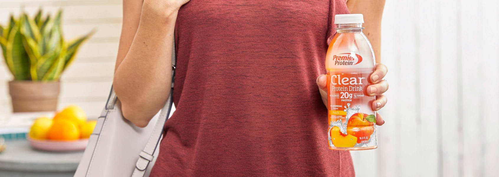A photo of Premier Protein Peach Clear Protein Drink.
