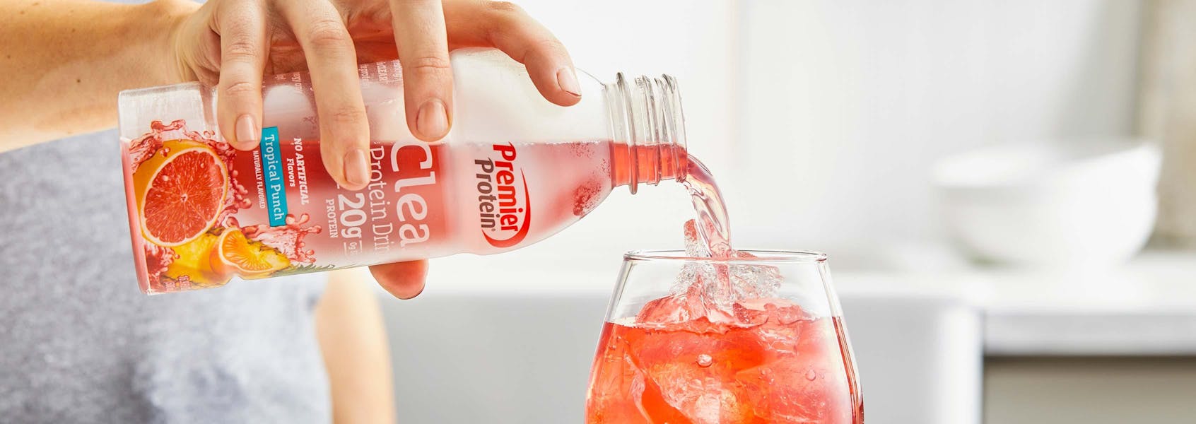 A photo of Premier Protein Tropical Punch Clear Protein Drink.